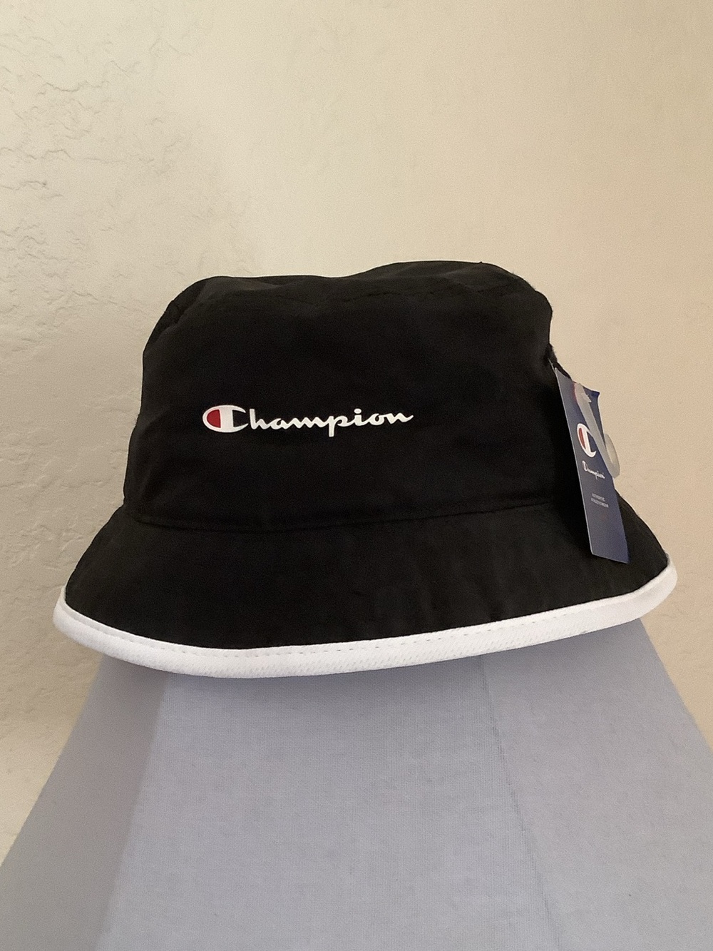 Champion Black Bucket Hat with White Trim and Script Logo